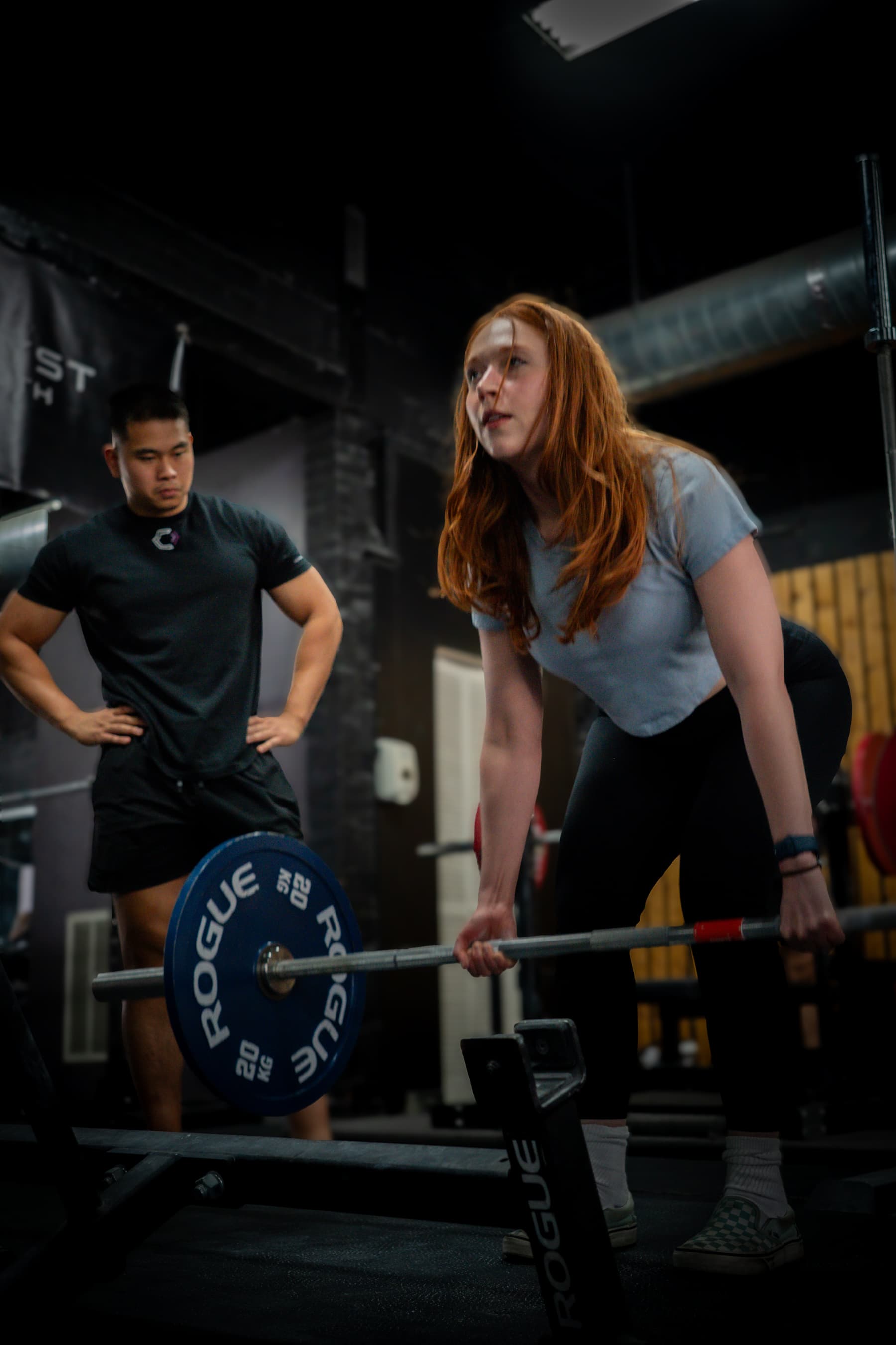 Catalyst Strength head coach training a client